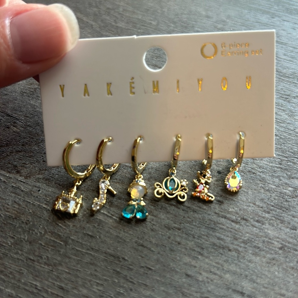 Gold plated dangle hoop Cinderella earrings.